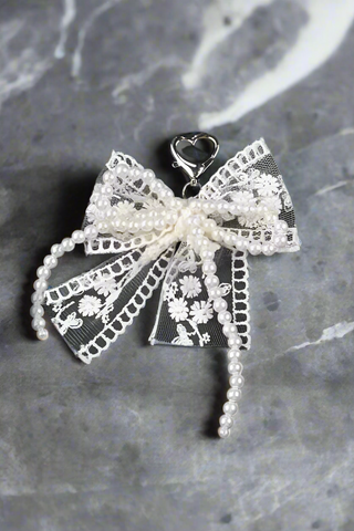 ETA 2/4 - White Lace and Pearl Bow Purse Charm