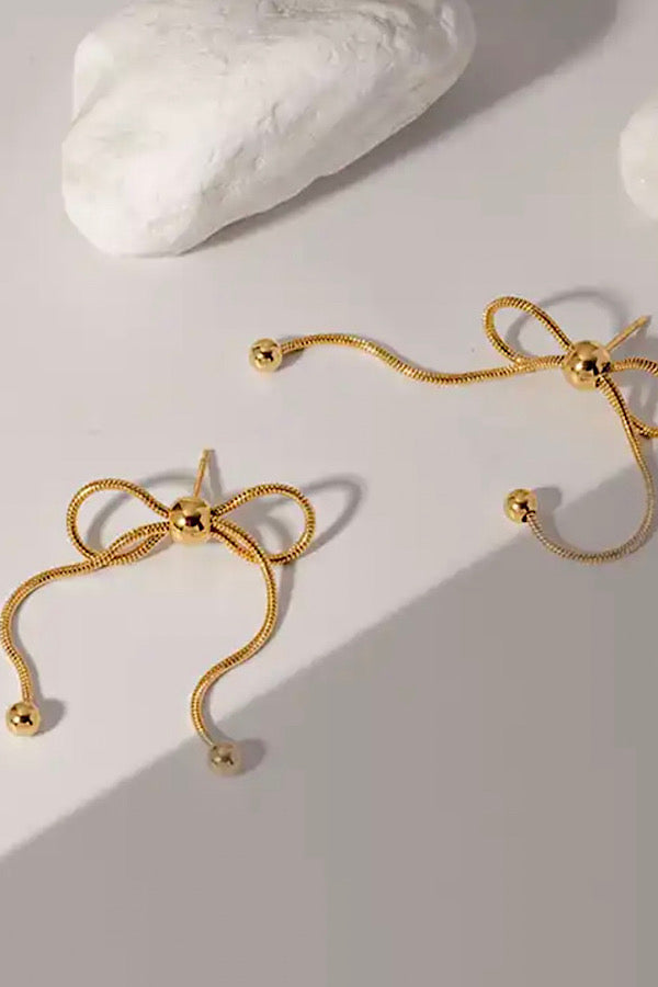 Natural Elements Gold Dangle Bow Earrings