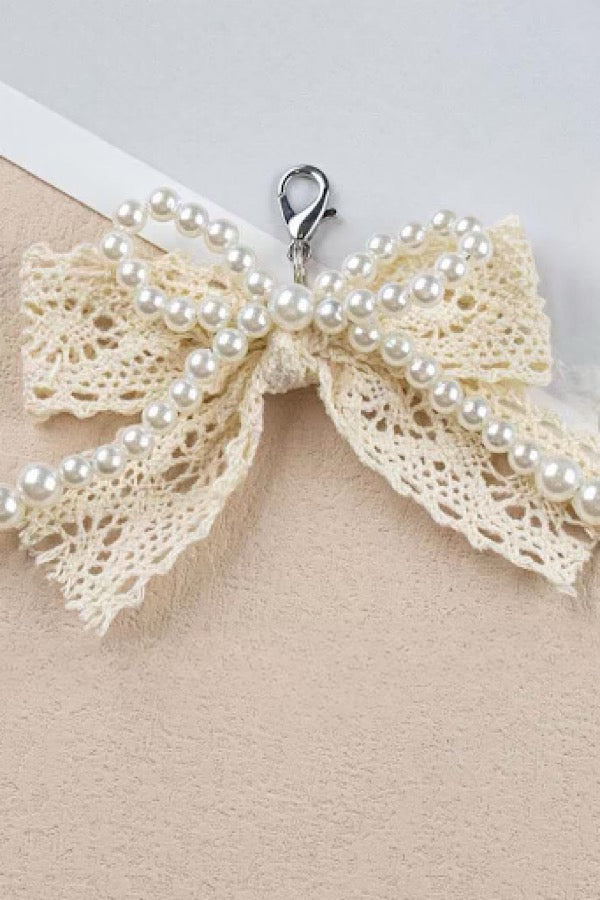 ETA 2/4 - Cream Lace and Pearl Bow Purse Charm