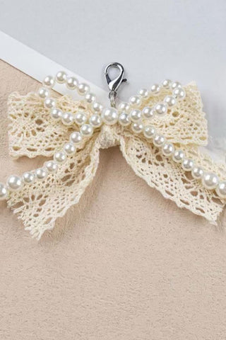 ETA 2/4 - Cream Lace and Pearl Bow Purse Charm