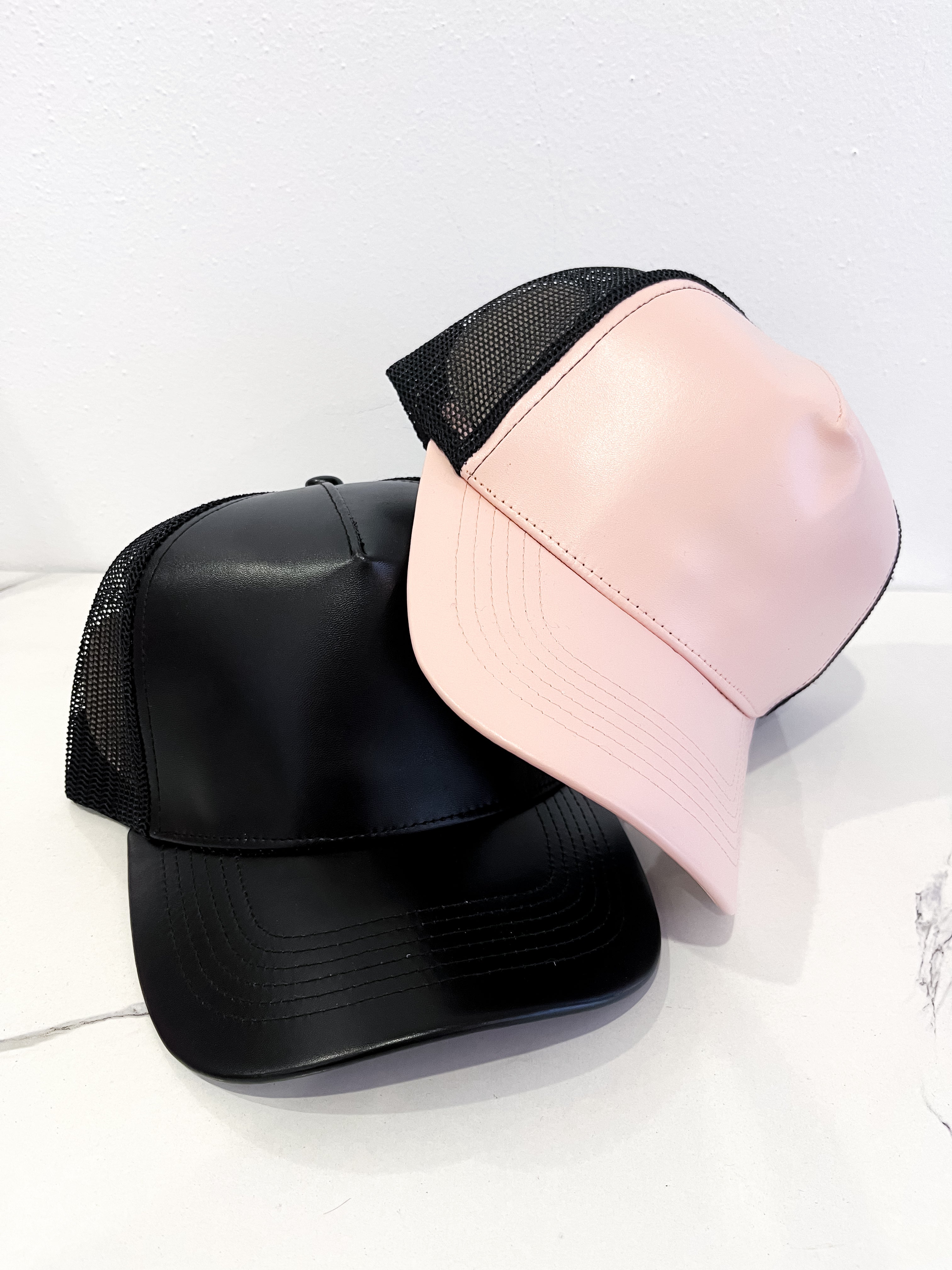 Pale Pink on Black Faux Leather Trucker Hat